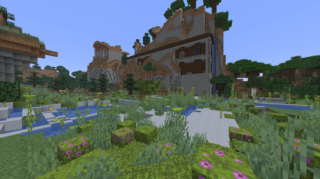 A fairly large surface lush biome located next to a woodland mansion